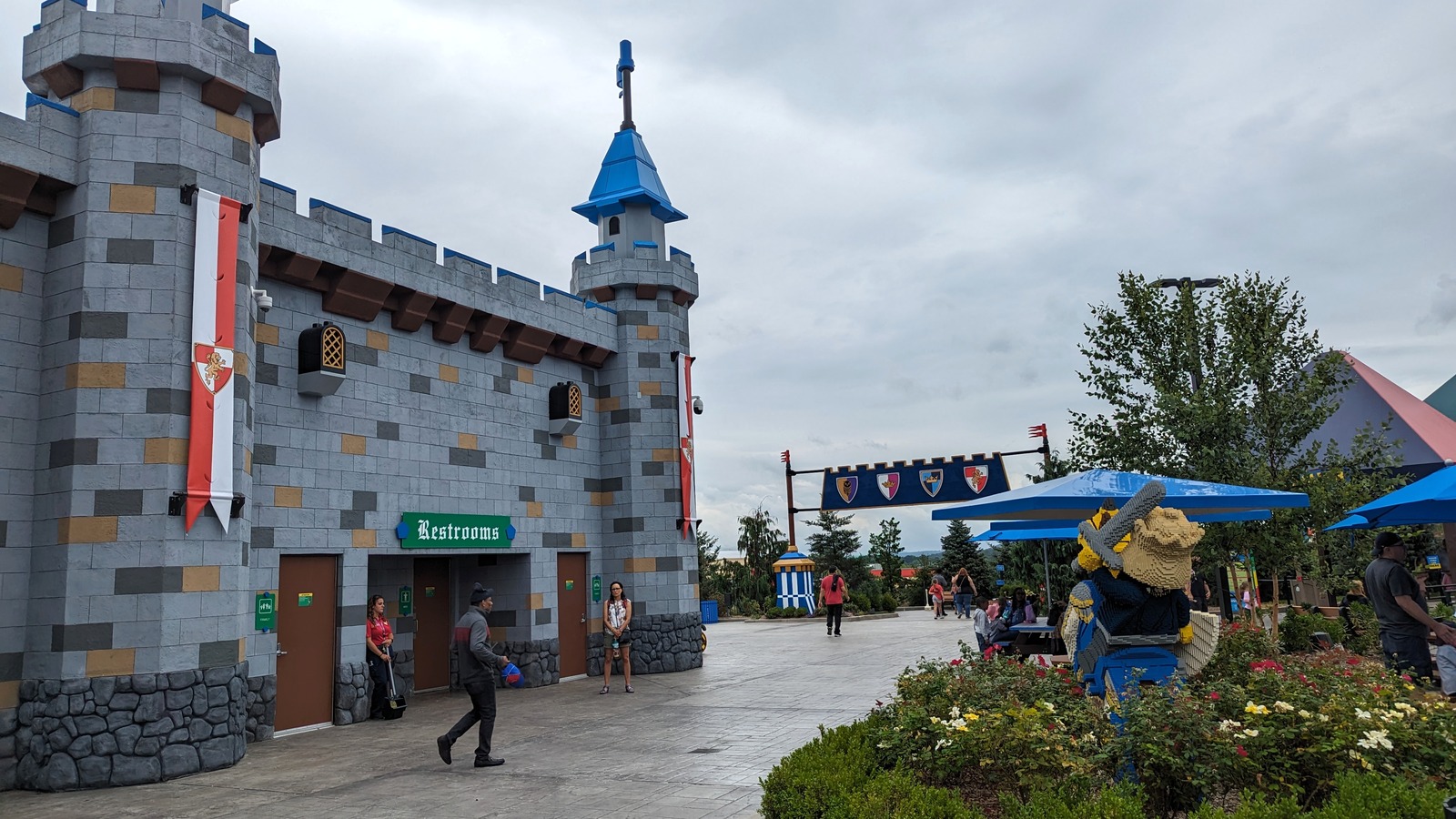 Castle-themed restroom facade and courtyard in LEGO Castle at LEGOLAND New York