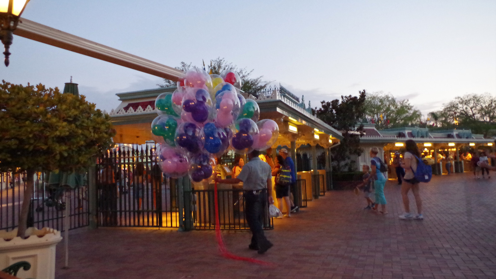 Disneyland Park entrance with Mickey Mouse balloons in Anaheim