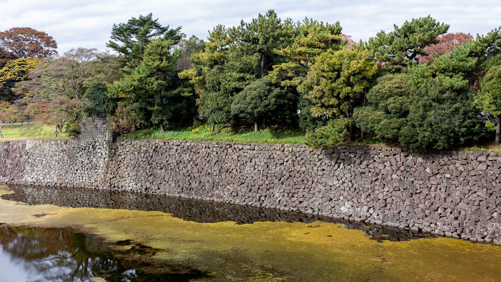 Stone walls and moat at the Edo Castle ruins in Tokyo