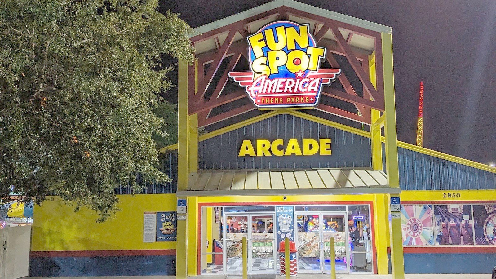 Fun Spot America Kissimmee Arcade entrance and illuminated sign at night