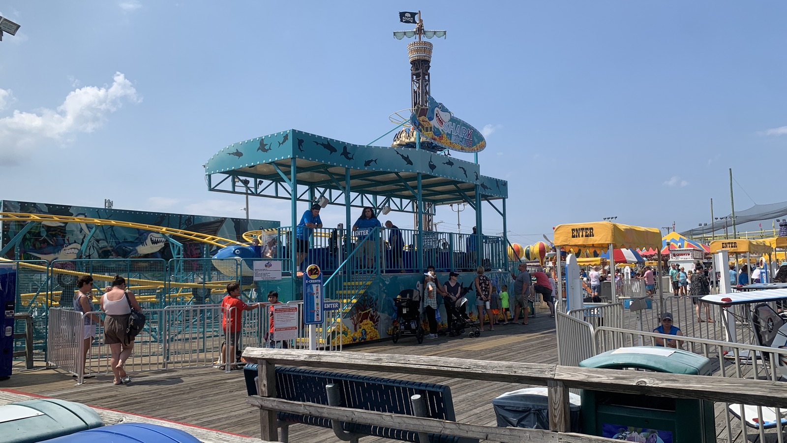 Shark Escape station with ride structure and boardwalk midway