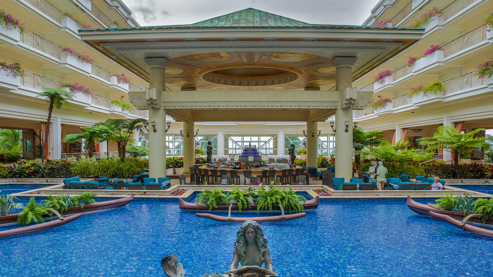Historic photograph of the open-air courtyard and water features inside Grand Wailea Resort on Maui