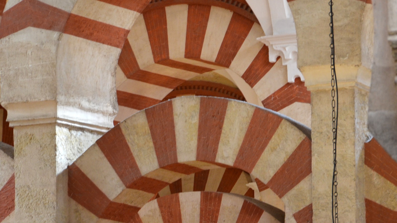 Striped double arches in the Mosque Cathedral of Córdoba hypostyle hall