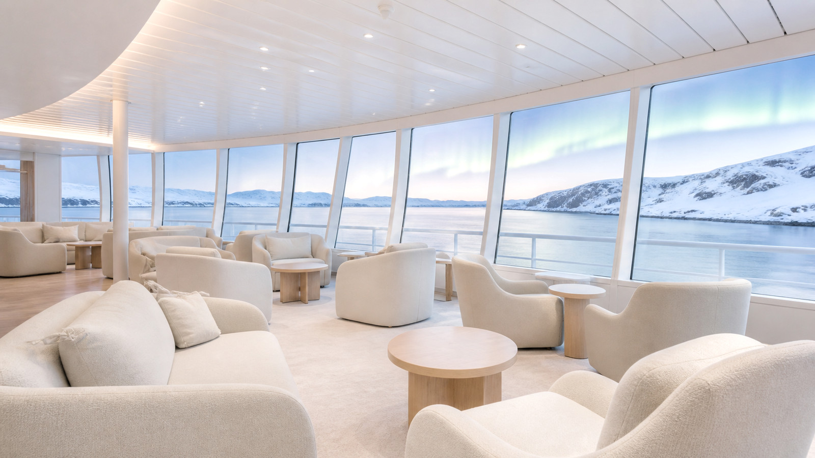 Representative bright observation lounge overlooking a snowy coast and subtle aurora