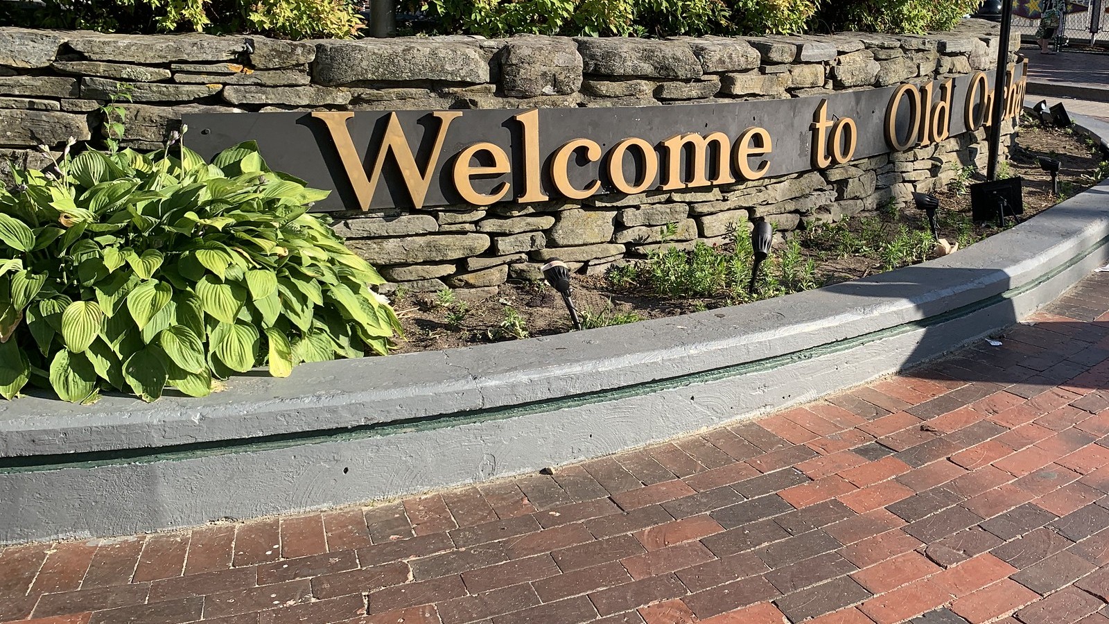 Old Orchard Beach welcome wall and brick pedestrian approach beside Palace Playland