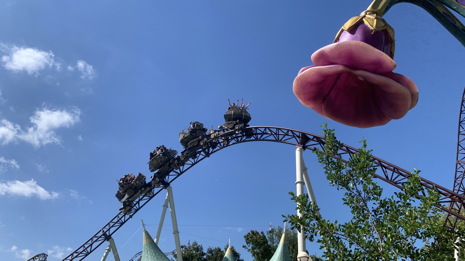 The Ride to Happiness coaster train and track at Plopsaland in August 2022