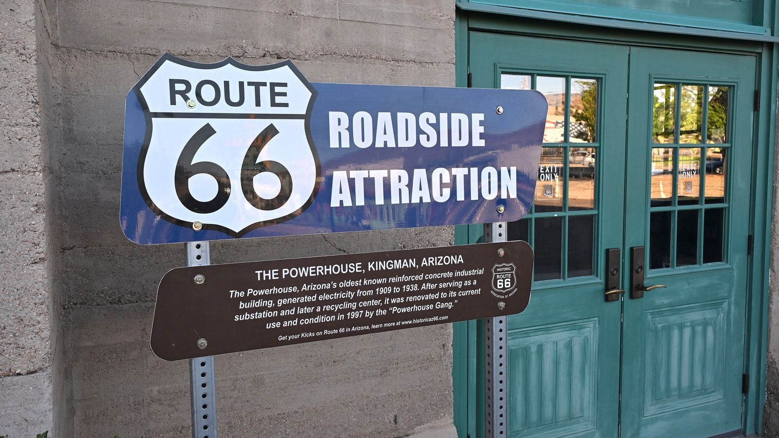 Route 66 roadside attraction sign outside Kingman's Historic Powerhouse