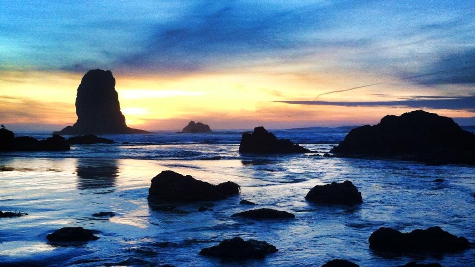 Haystack Rock at Cannon Beach Oregon, a ranked stop in this local guide