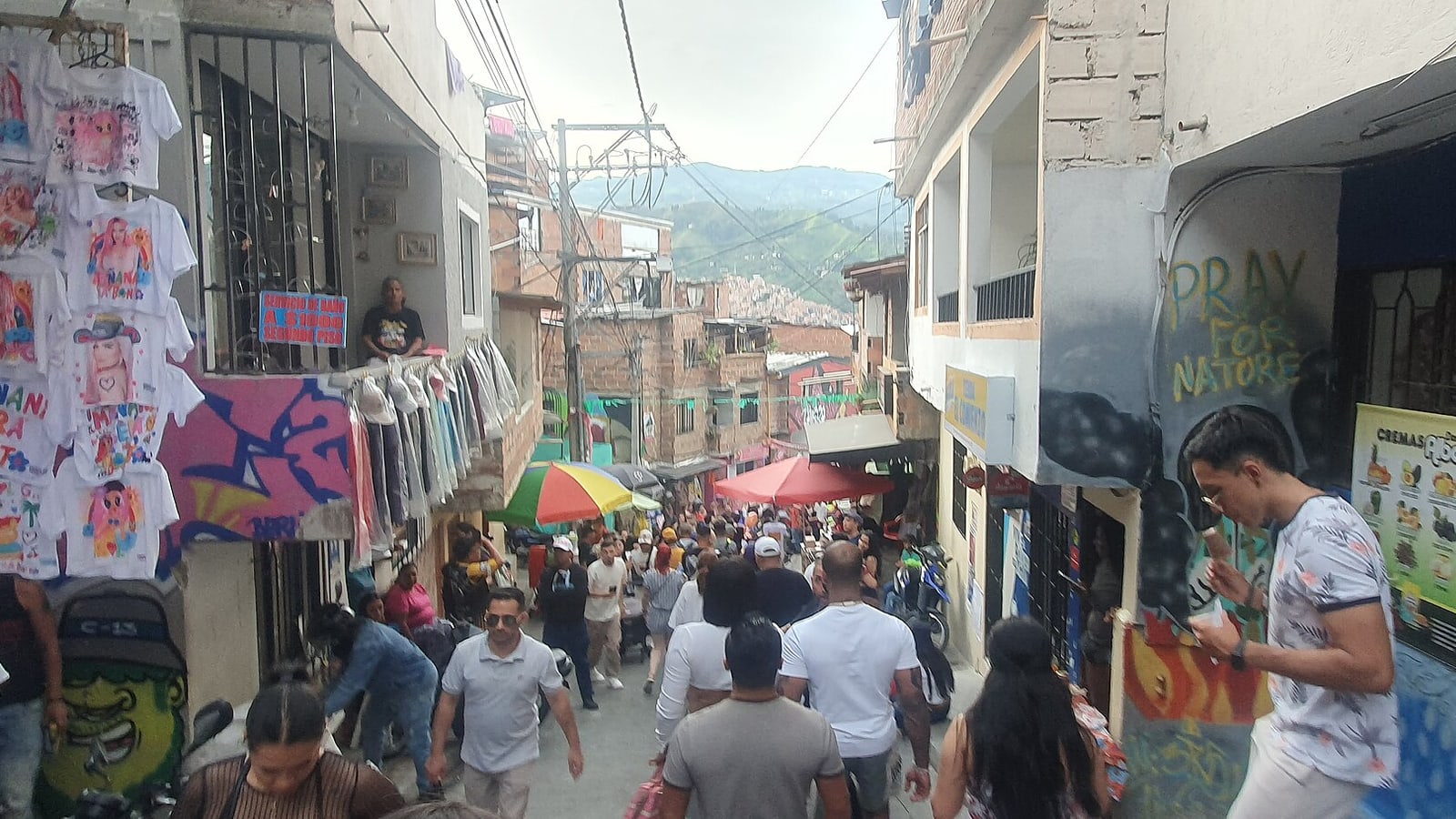 Colorful street art and outdoor escalators in Comuna 13 Medellín