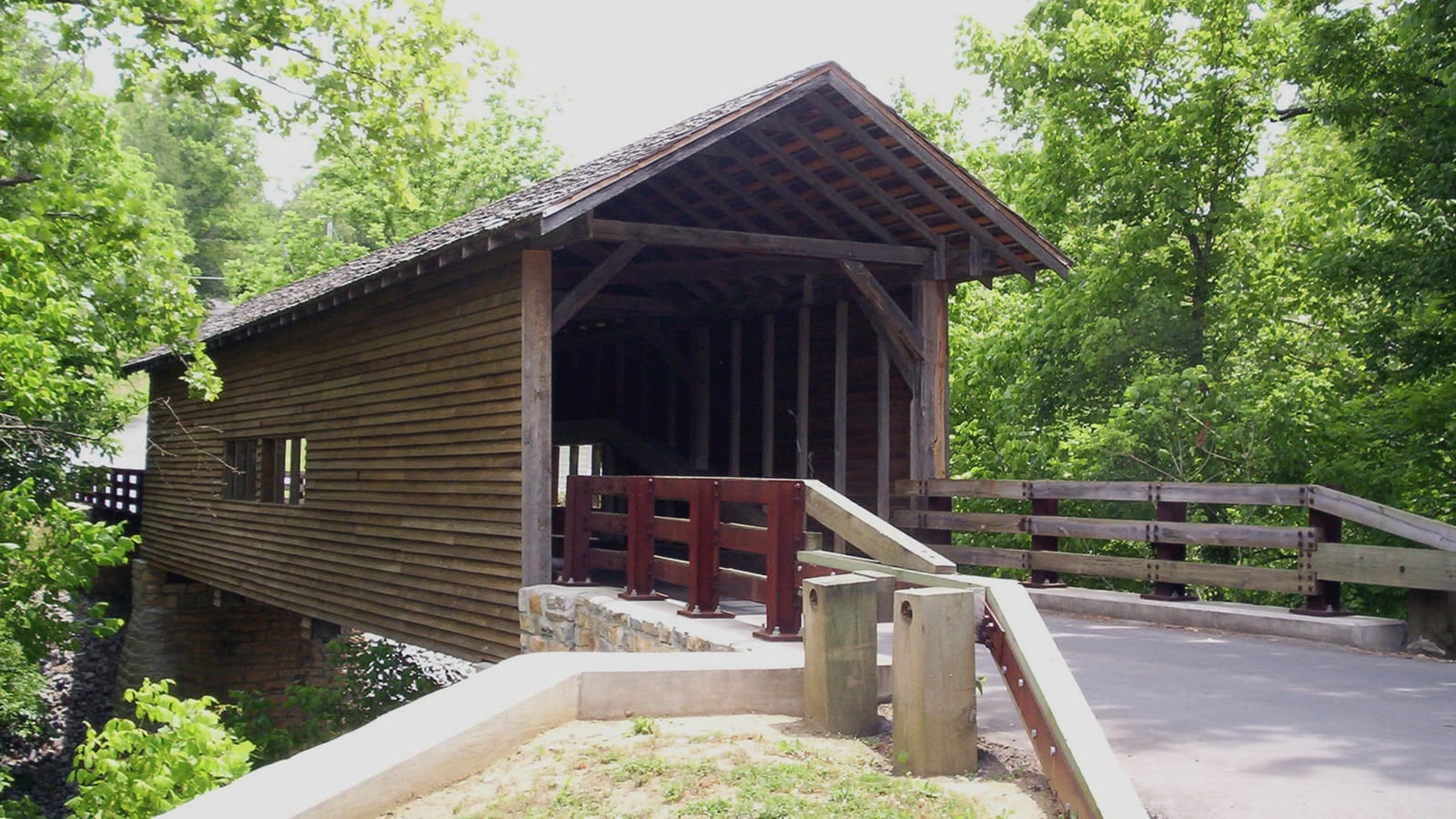 Historic wooden Harrisburg Covered Bridge over the Little Pigeon River near Sevierville Tennessee