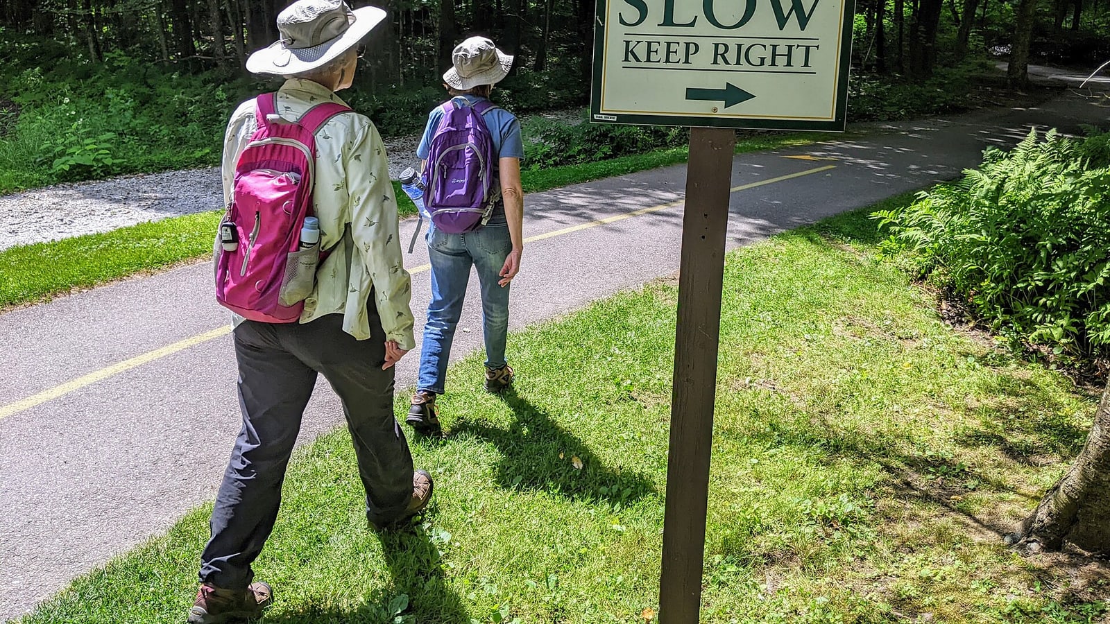 Travelers walking on the Stowe Recreation Path in Vermont