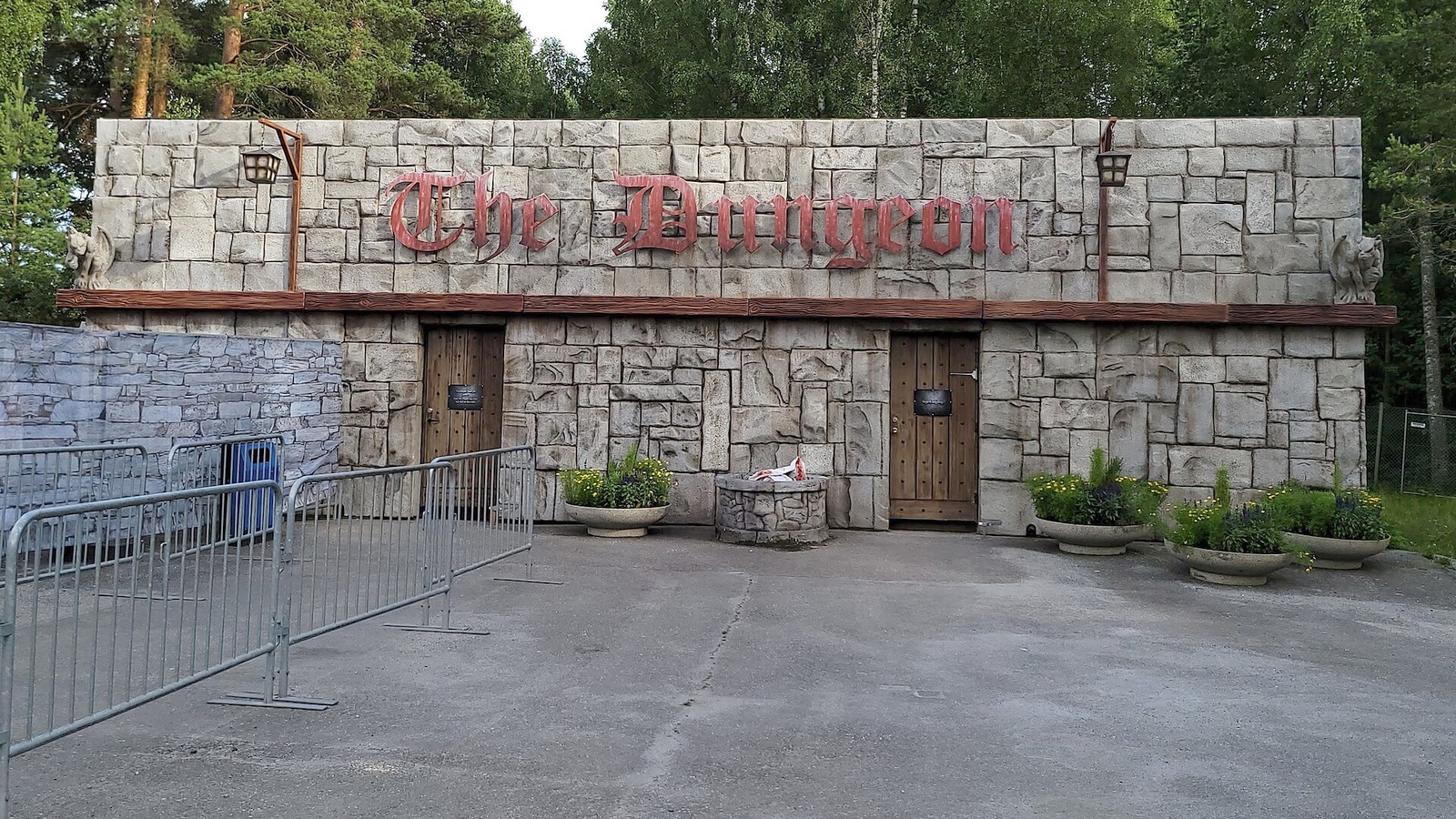 The Dungeon stone facade and entrance at TusenFryd in July 2022