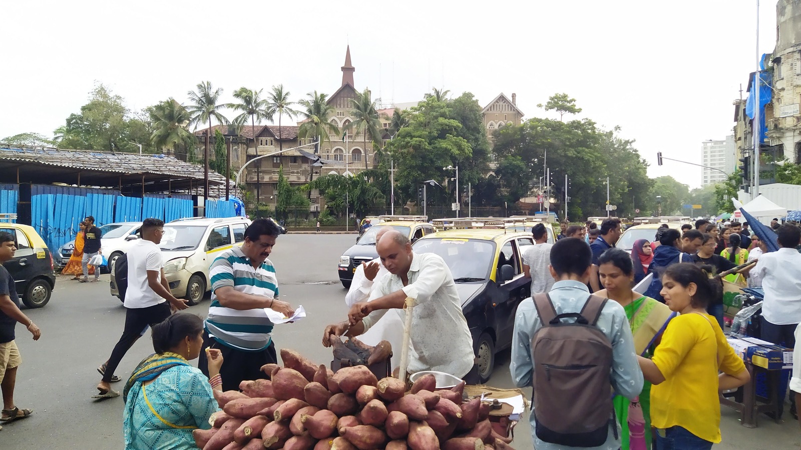 Street-food vendors and a potato snack stand in Kalbadevi, Mumbai