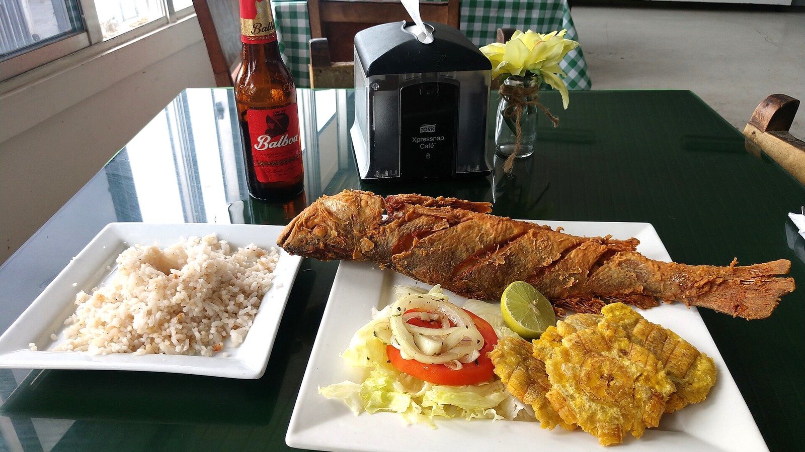 Panamanian fried fish with coconut rice and patacones