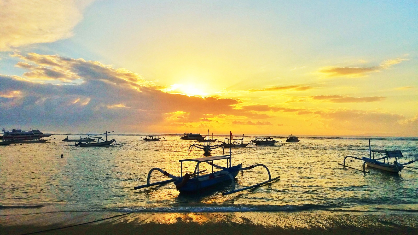 Bright sunrise beach view in Sanur Bali