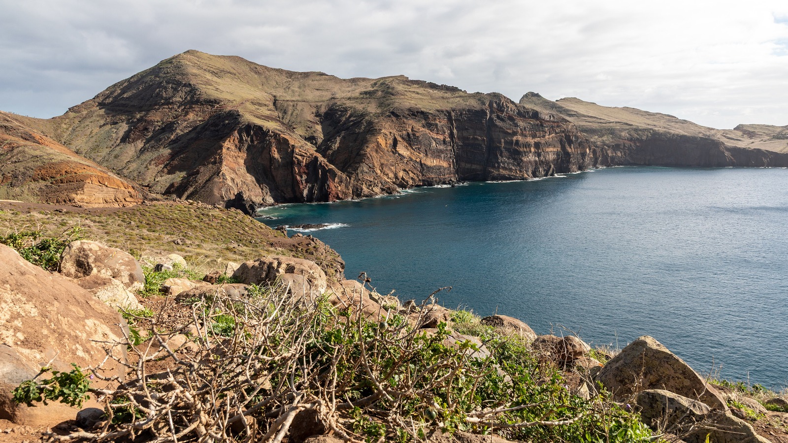 Bright Machico Bay with mountains on Madeira's east coast