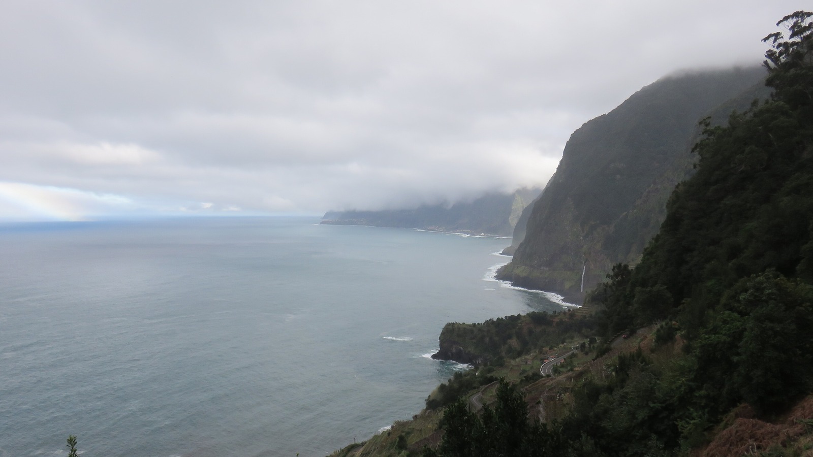 Bright volcanic coast and green cliffs near Porto Moniz Madeira
