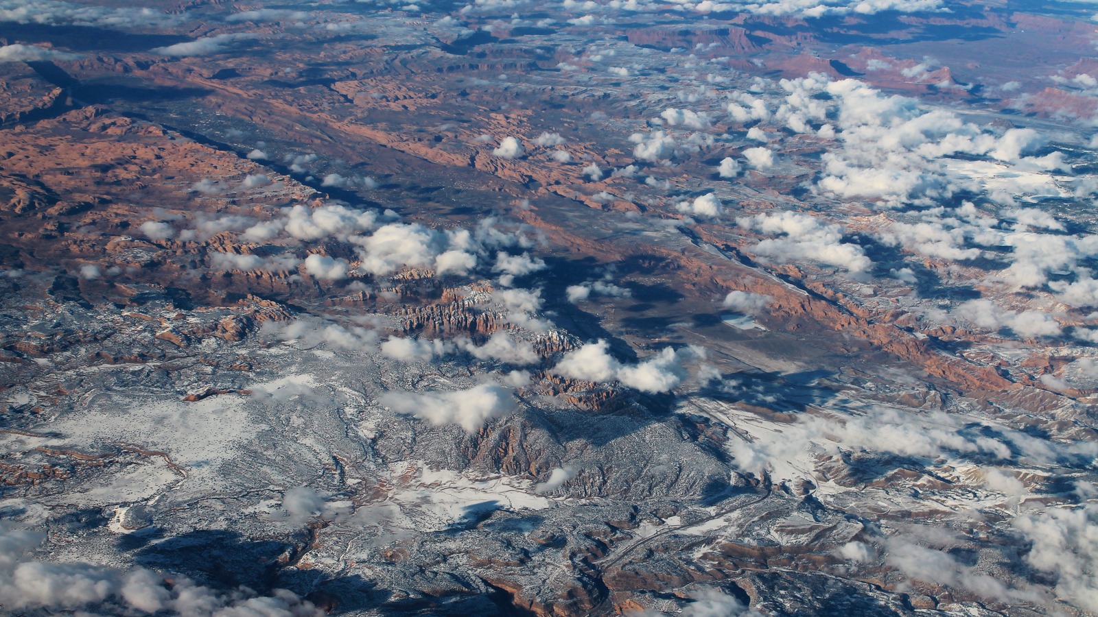 Desert valley and red cliffs south of Moab in Spanish Valley