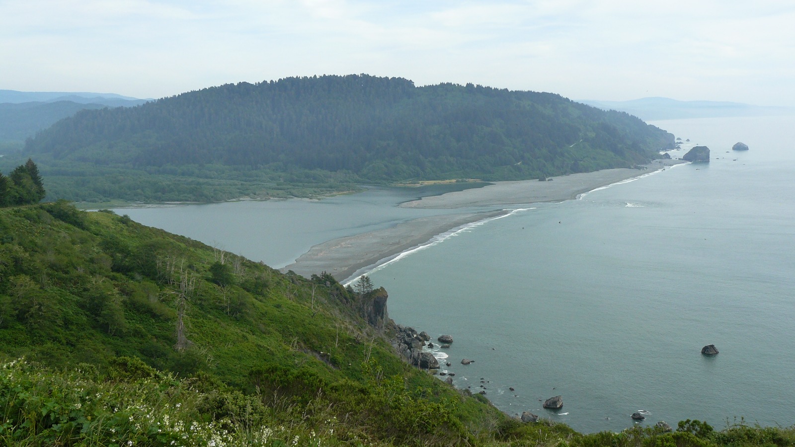 Bright Klamath River estuary and redwood coast near Requa California