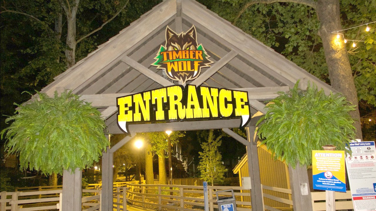 Illuminated Timber Wolf entrance at Worlds of Fun at night