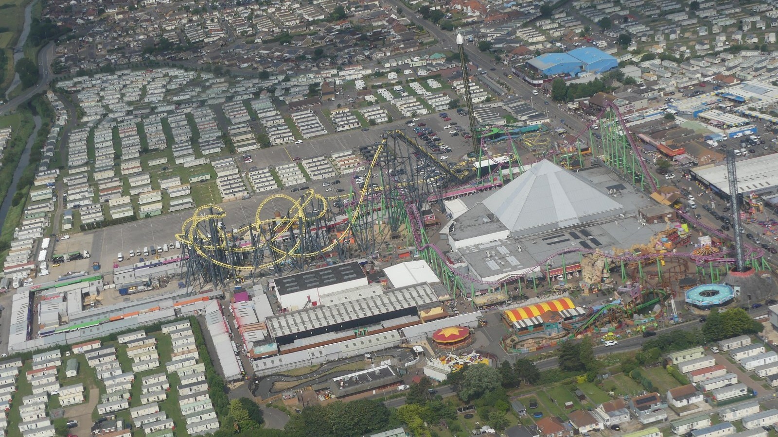Aerial view of Fantasy Island's coaster tracks and surrounding Ingoldmells in July 2023, not the Fear Island Halloween event