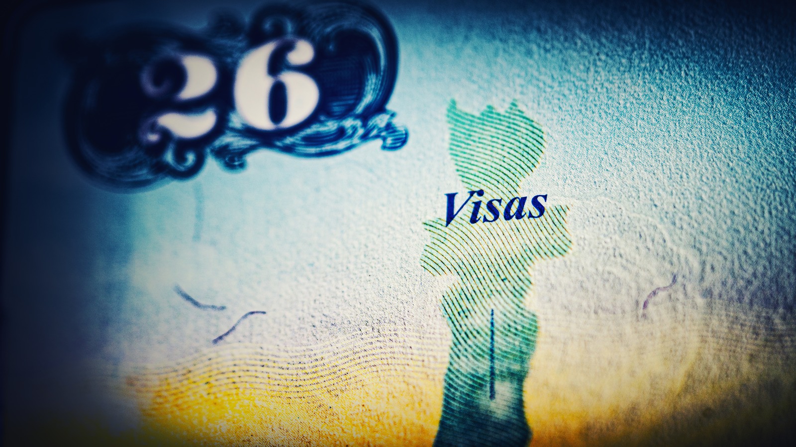 Close view of a United States passport visa page showing the word Visas