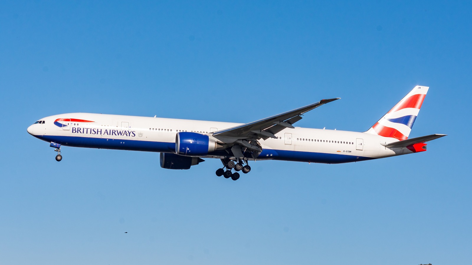 British Airways Boeing 777-300ER G-STBM landing at London Heathrow