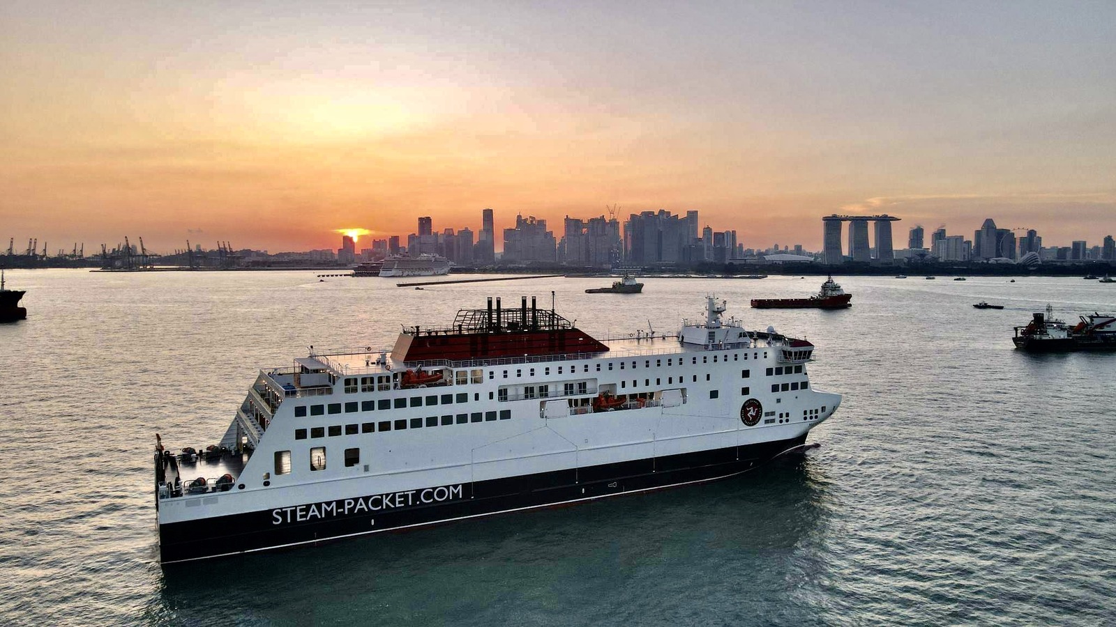 MV Manxman ferry in Steam Packet livery on open water at sunset