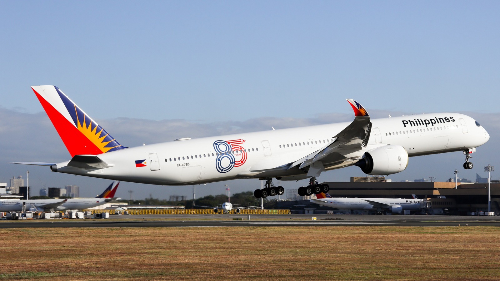 Philippine Airlines Airbus A350-1000 RP-C3510 in 85th anniversary markings taking off from Manila