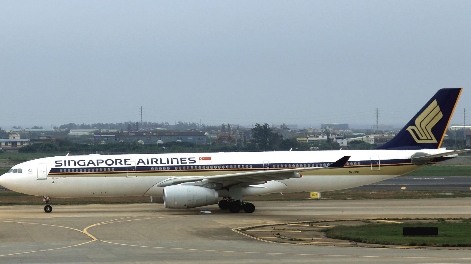 Singapore Airlines aircraft on the taxiway at Taipei Taoyuan International Airport