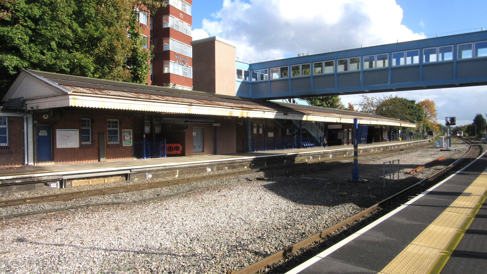 Historic October 2016 view of High Wycombe station platforms and footbridge in Buckinghamshire, England; not the 2026 ticket gates