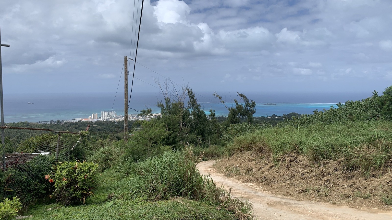 View toward Garapan and the lagoon on Saipan from Mount Tapochau under cloudy skies