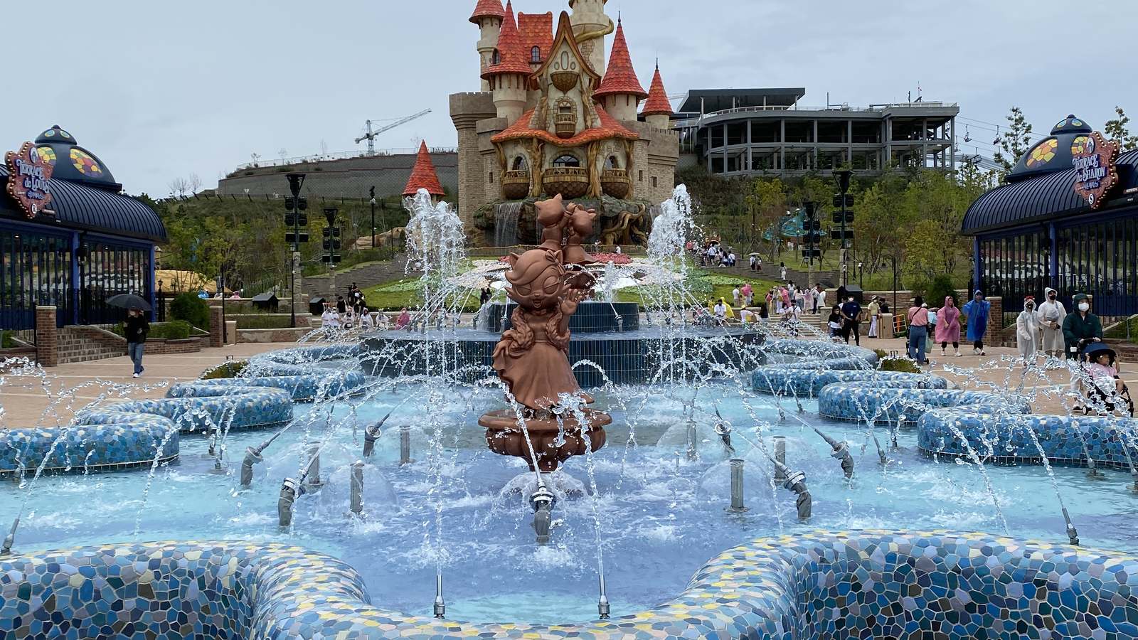 Fountain and fairy tale castle at the entrance plaza of Lotte World Adventure Busan in South Korea
