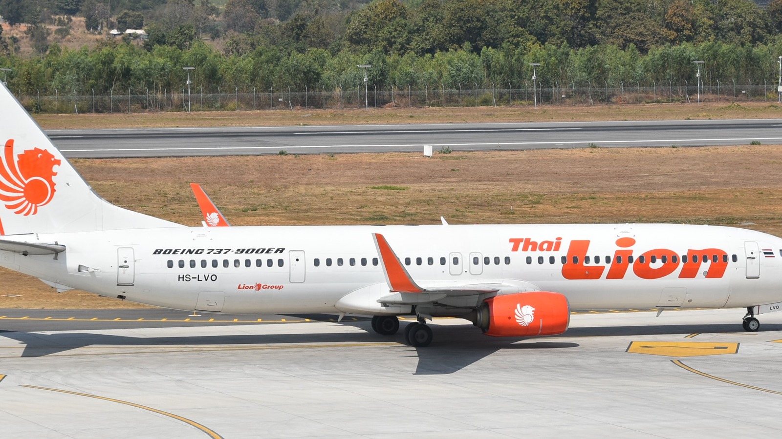 Thai Lion Air Boeing 737-9 on the ground at Khon Kaen airport in Thailand
