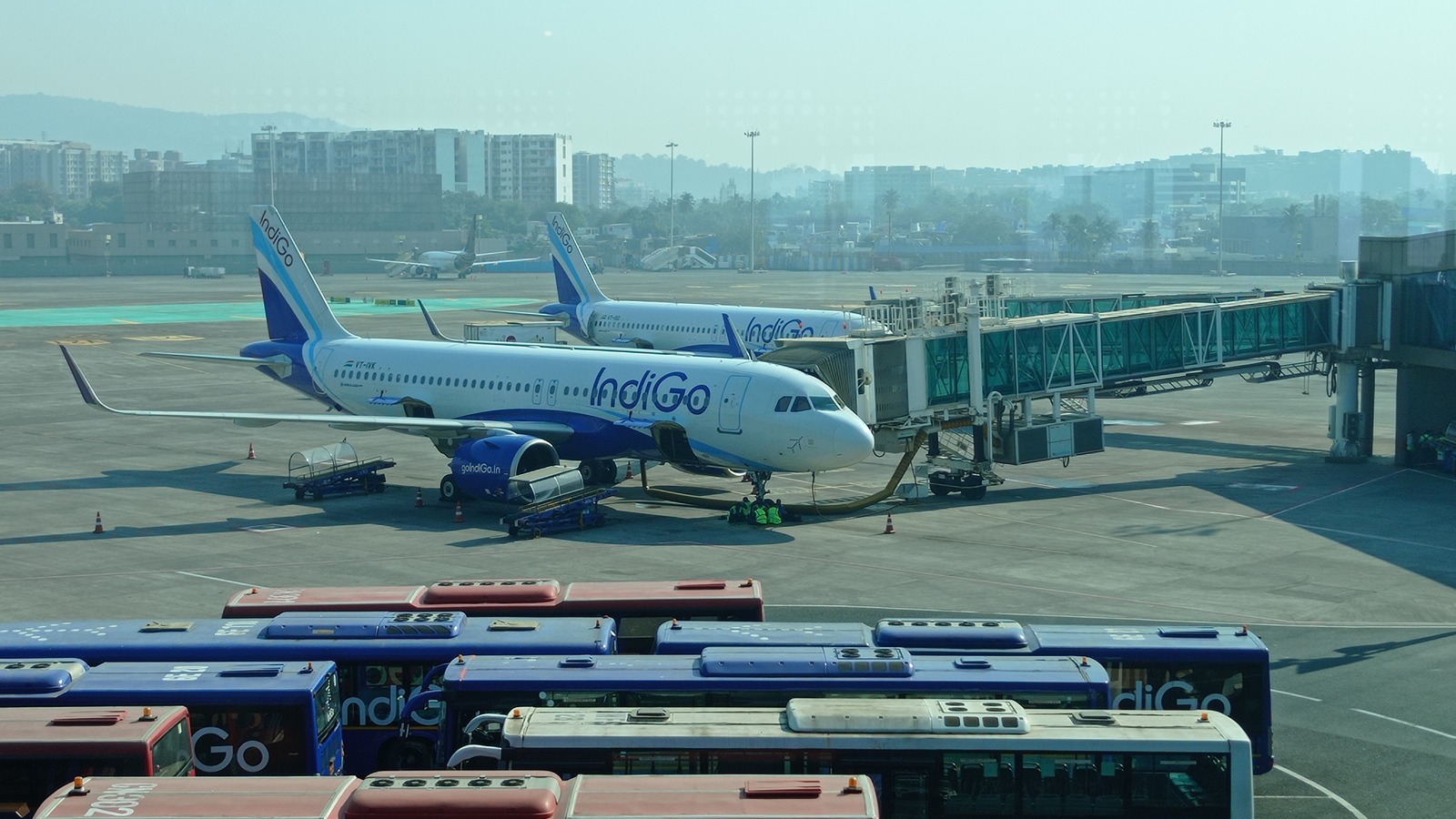 IndiGo Airbus A320 VT-ITK on the ramp at Mumbai Airport in daylight
