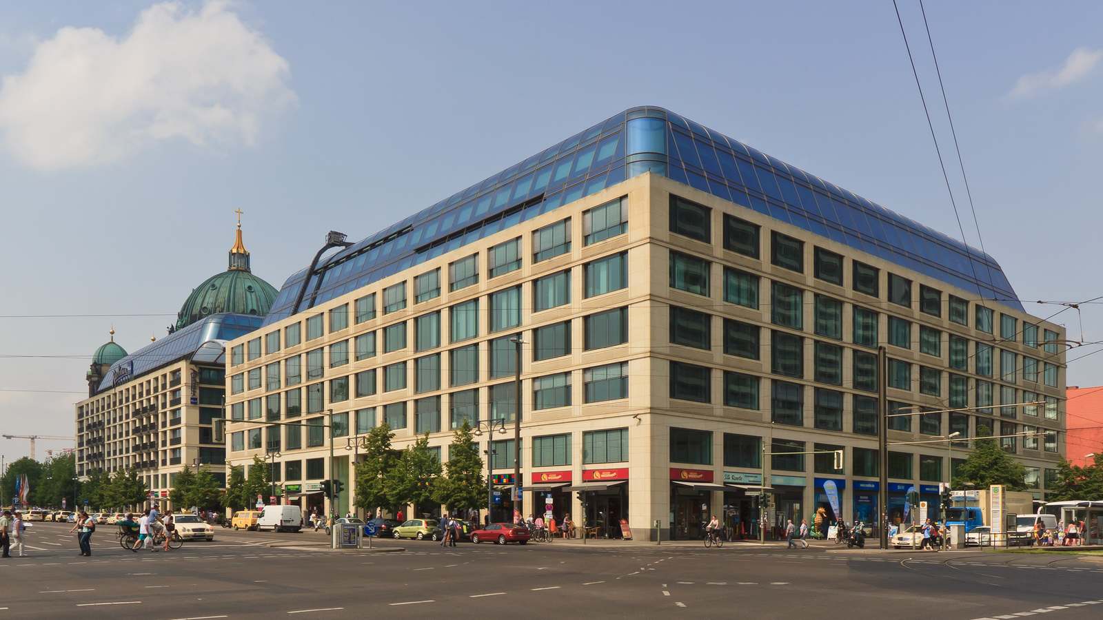 The DomAquaree building complex in Berlin-Mitte with the Berlin Cathedral dome behind