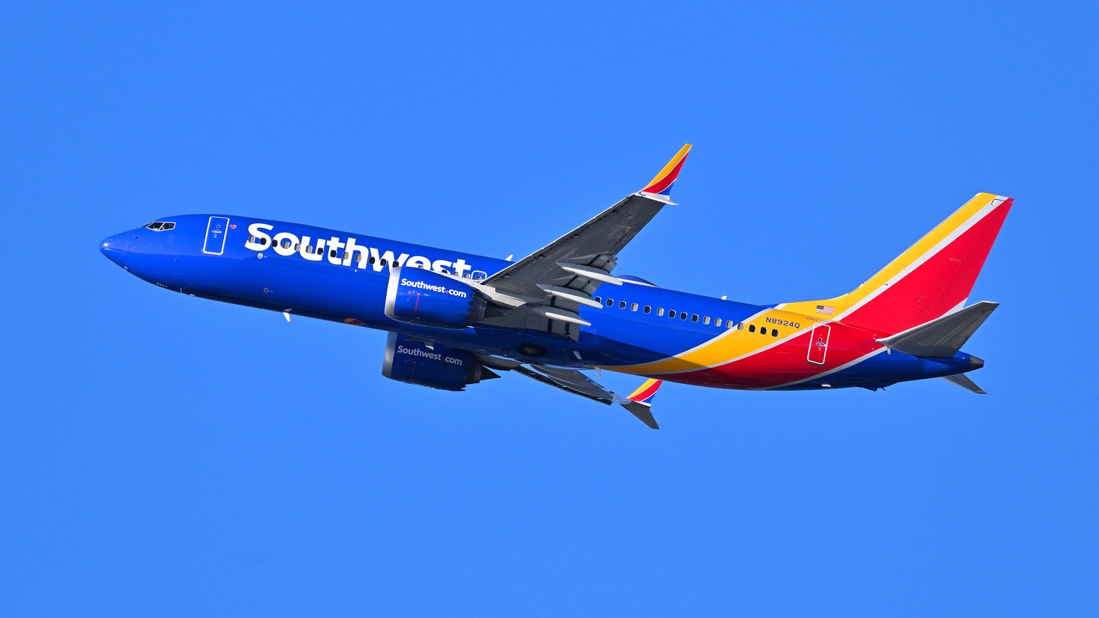 Southwest Airlines Boeing 737 MAX 8 climbing against a clear blue sky