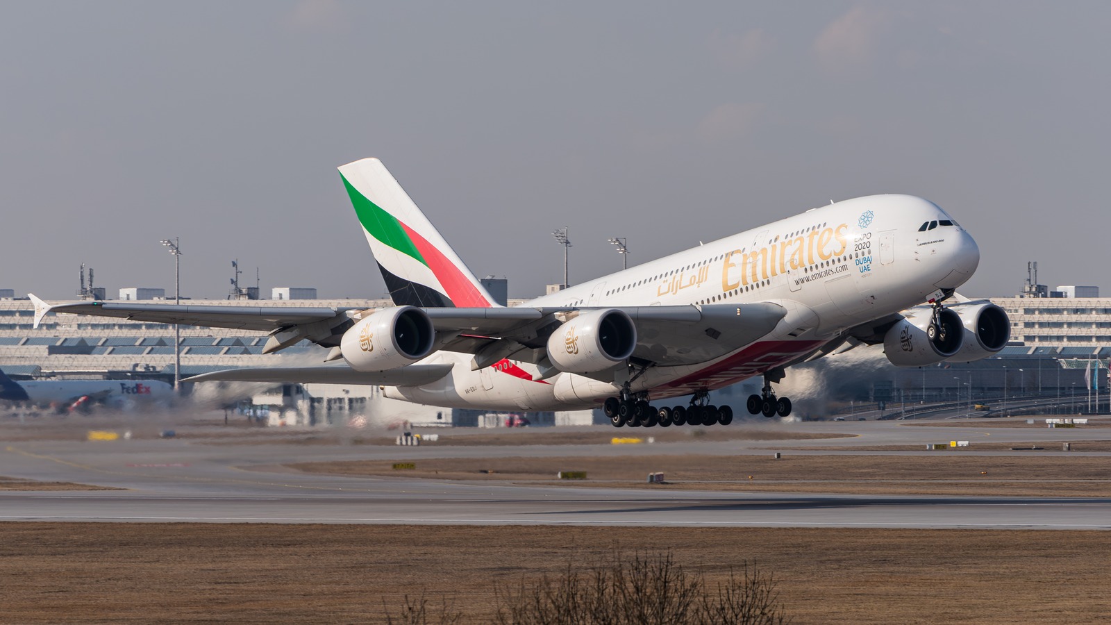 Emirates Airbus A380-861 A6-EDJ departing Munich Airport in daylight