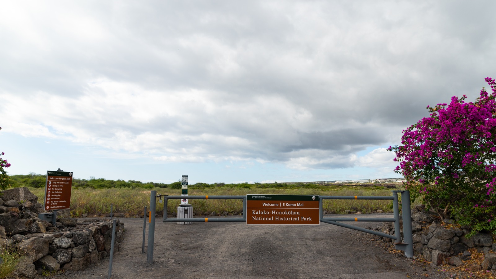 Entrance gate and National Park Service sign at Kaloko-Honokohau National Historical Park on Hawaii Island