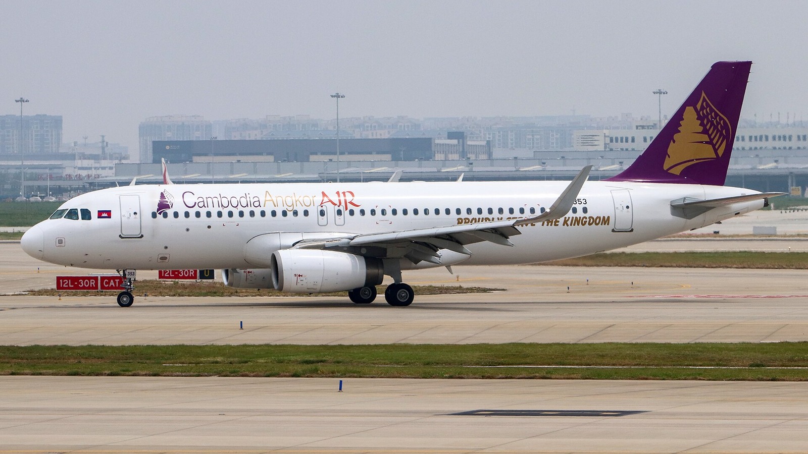 Airbus A320 of Cambodia Angkor Air, the carrier now operating as Air Cambodia, taxiing at an airport