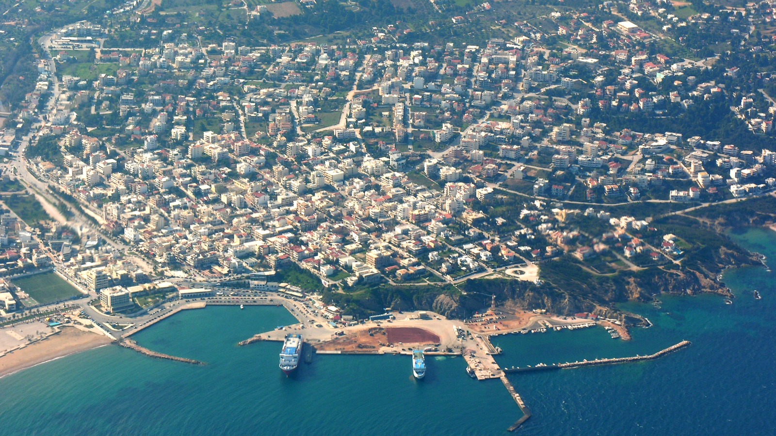 Aerial view of Rafina Harbour with two ferries alongside the piers on the Attica coast.