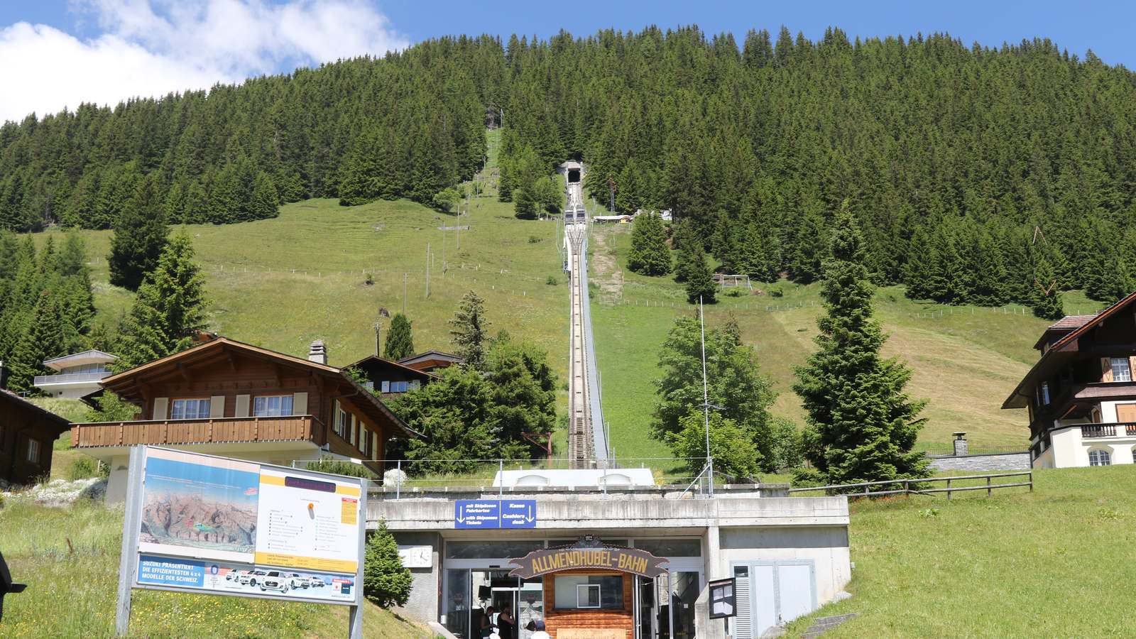 Allmendhubel funicular valley station and track climbing the hillside above Mürren, photographed in summer 2018