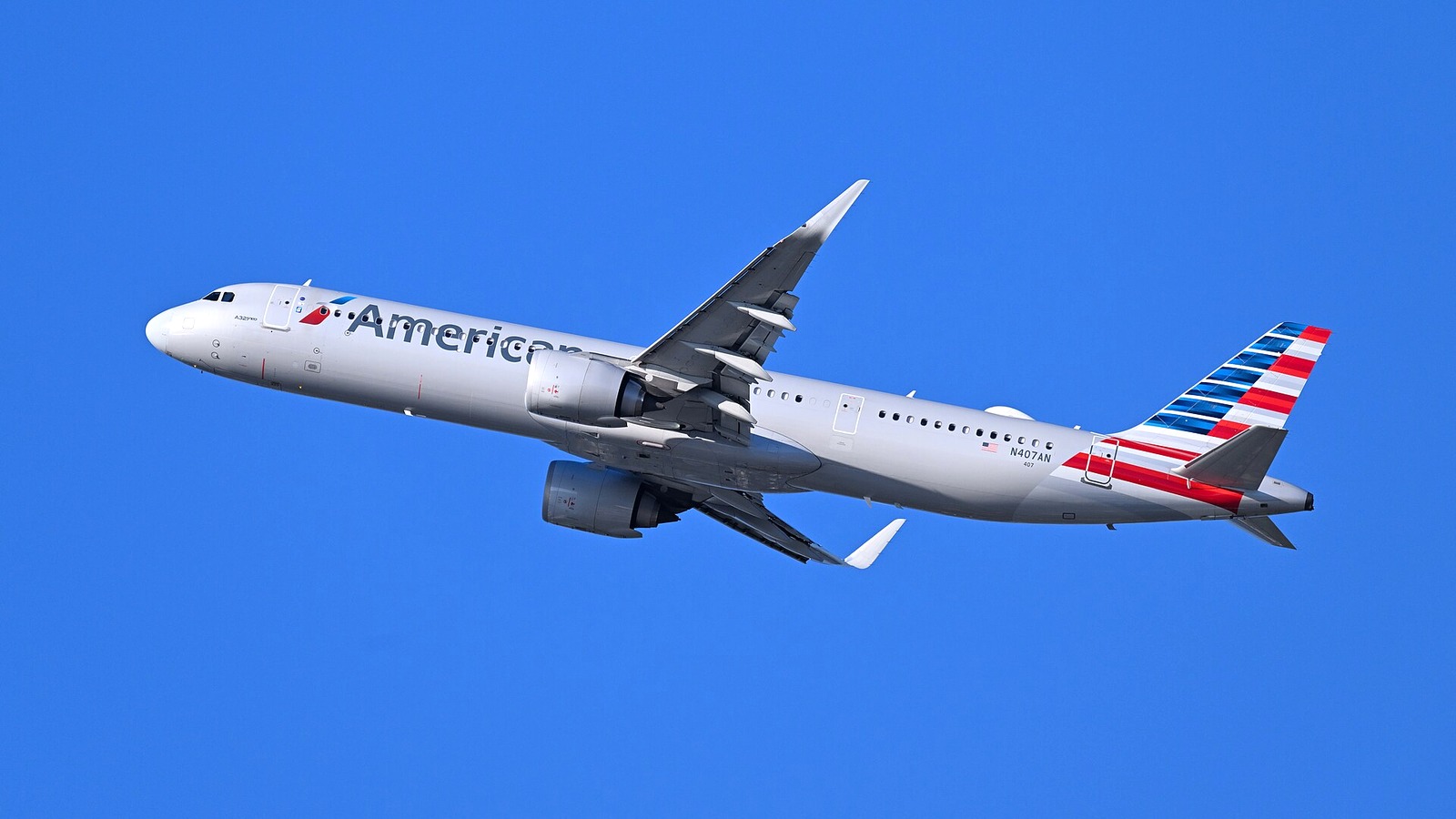 American Airlines Airbus A321neo N407AN climbing after departure from Boston