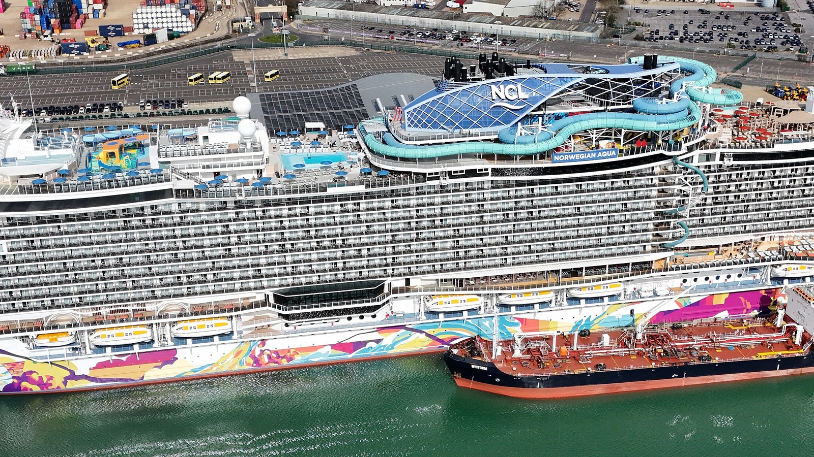 Norwegian Aqua, a smaller sister ship of Norwegian Aura, alongside a pier at Southampton in March 2025