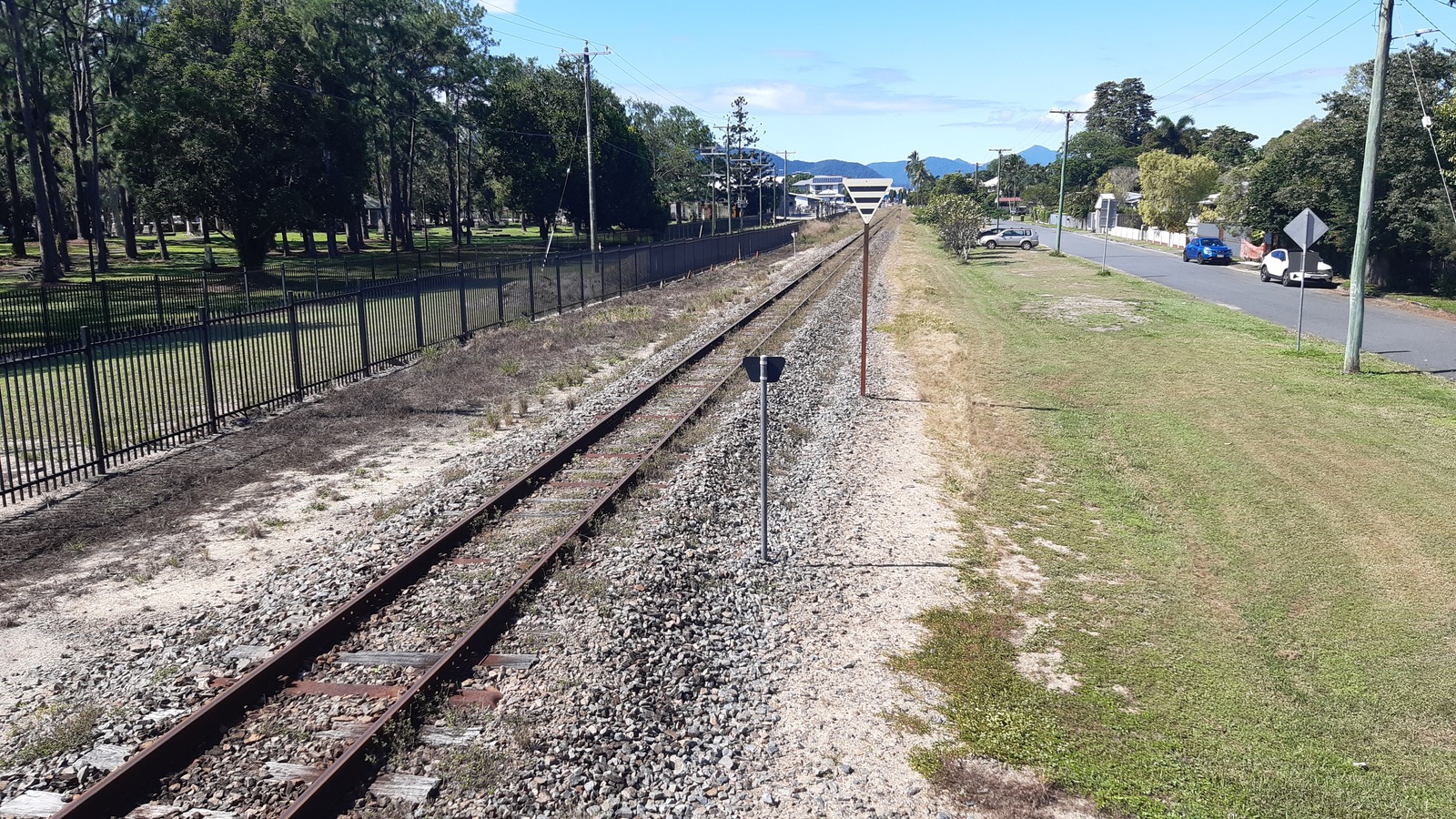 Kuranda Scenic Railway train crossing Grove Street in Cairns, Australia