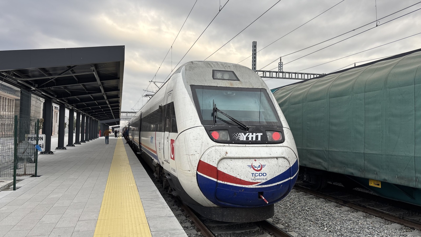 A TCDD YHT high-speed train waiting at a platform at Edirne station in Turkey