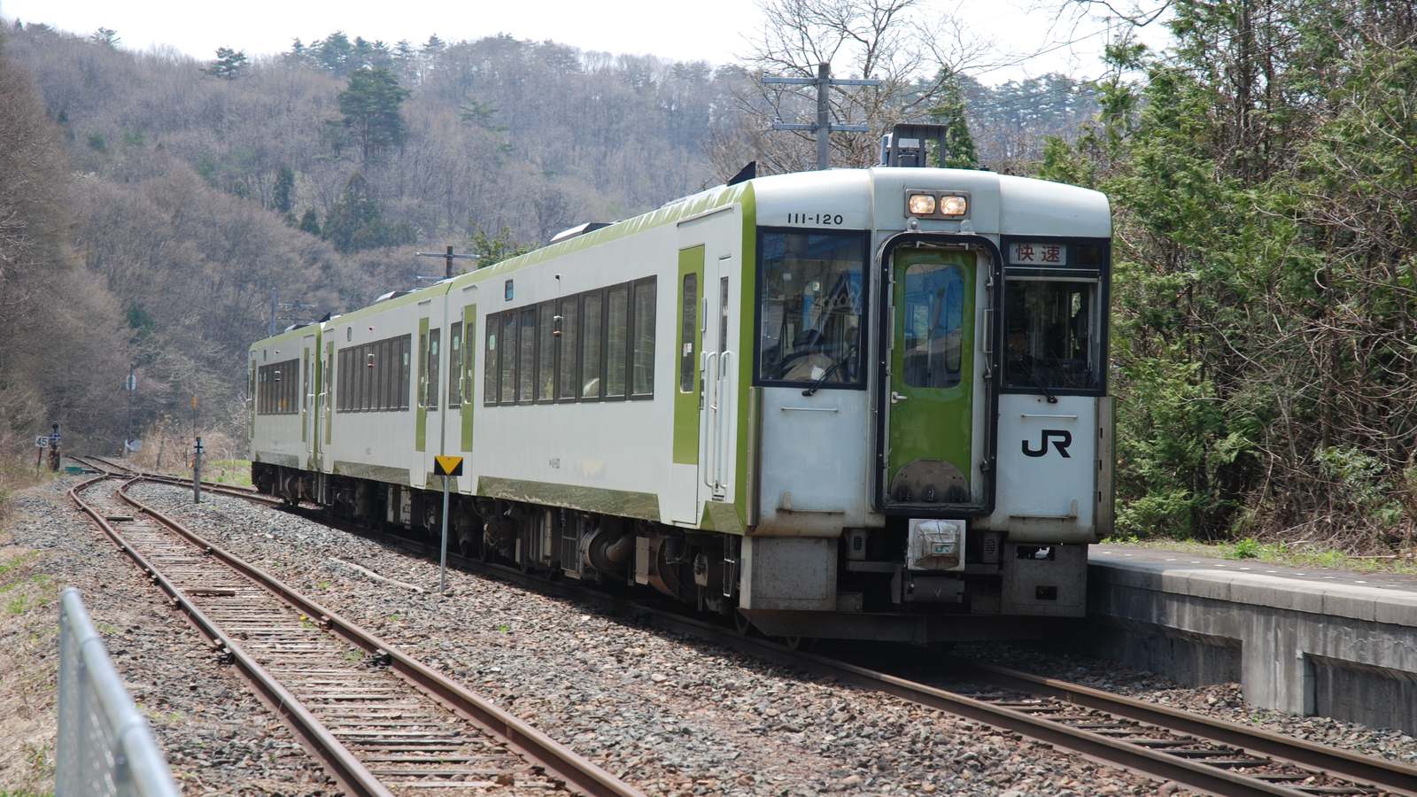 JR East KiHa 110 series diesel train on the Yamada Line at Kamiyonai station in Iwate, photographed in 2010