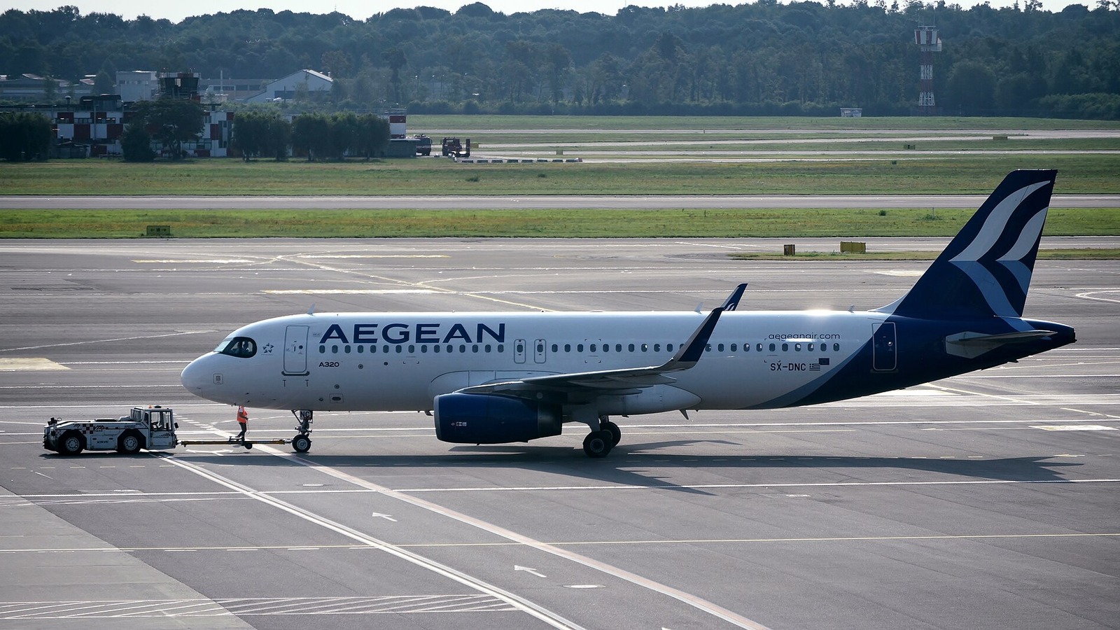 Aegean Airlines Airbus A320 being pushed back at Milan Malpensa airport