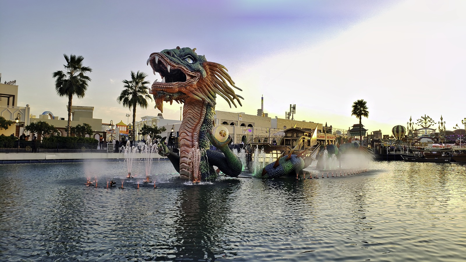 Archival January 2023 view of Global Village Dubai's dragon fountain and park pavilions; not the October 2026 reopening