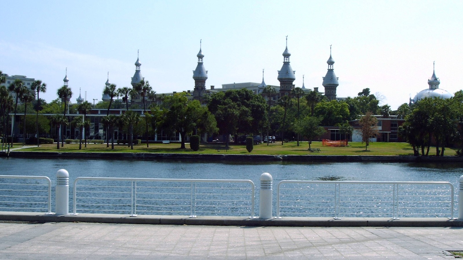 Tampa Riverwalk view across the Hillsborough River toward the University of Tampa downtown campus, the waterfront Hotel Cala will open onto in January 2027